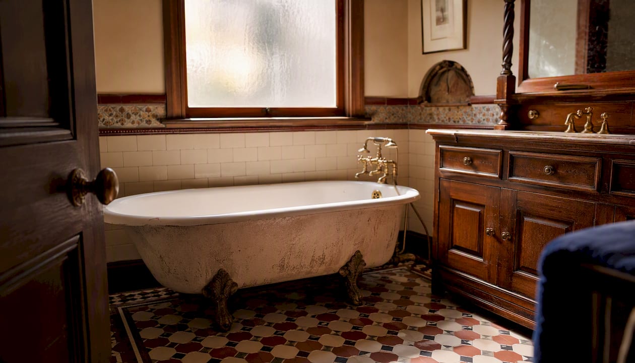 Cast-iron Victorian bathtub in heritage bathroom