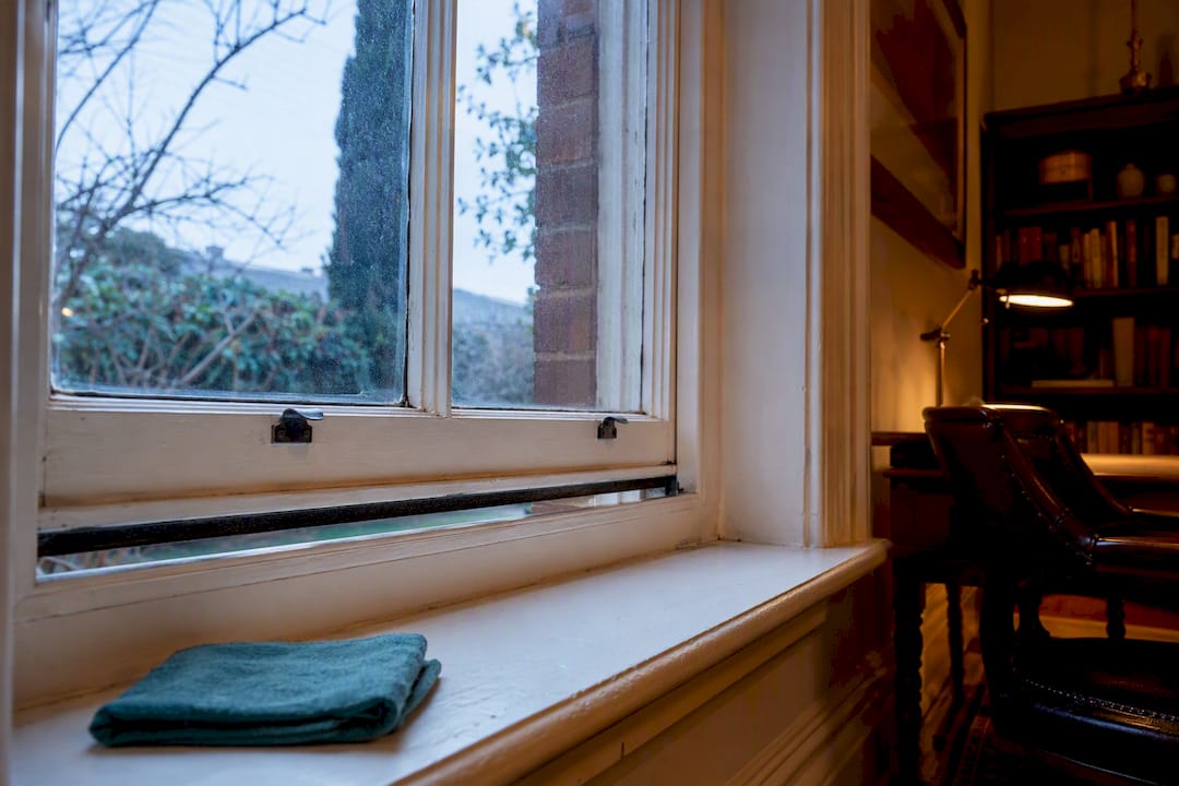 Victorian sash window showing draught gap